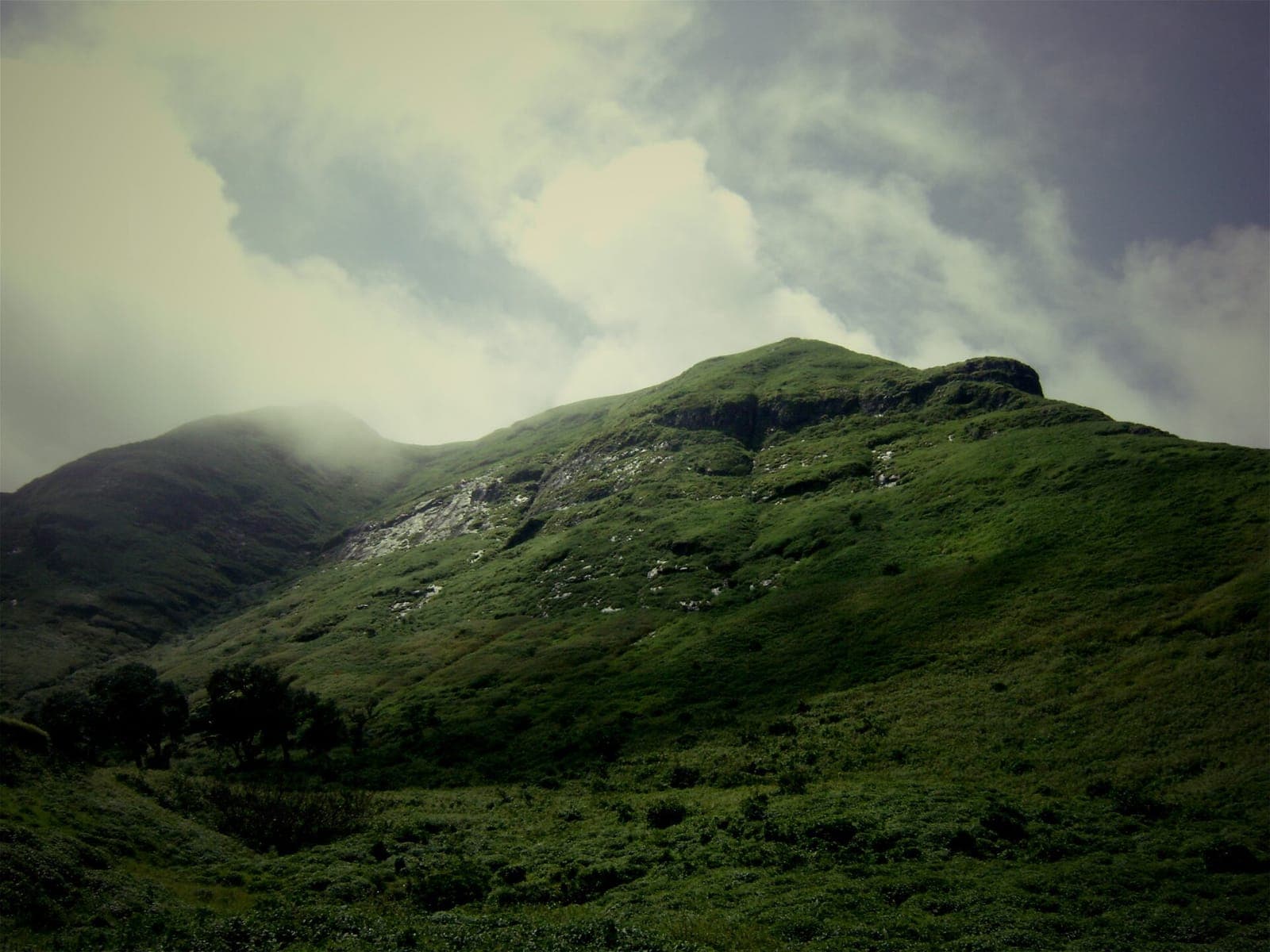 Brahmagiri peak under monsoon clouds